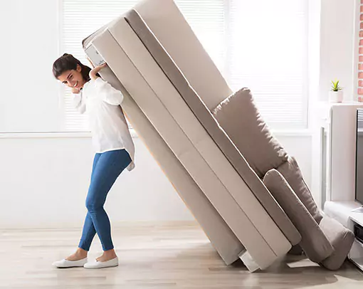 Woman moving flooring | PriceCo Floors